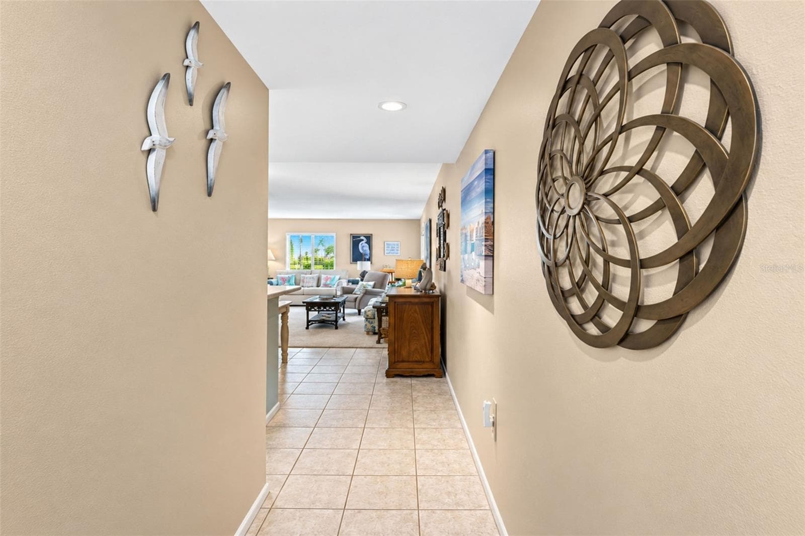 The tiled flooring carries into the kitchen & dining area from the front entry. - 2950 N BEACH RD #A321, ENGLEWOOD