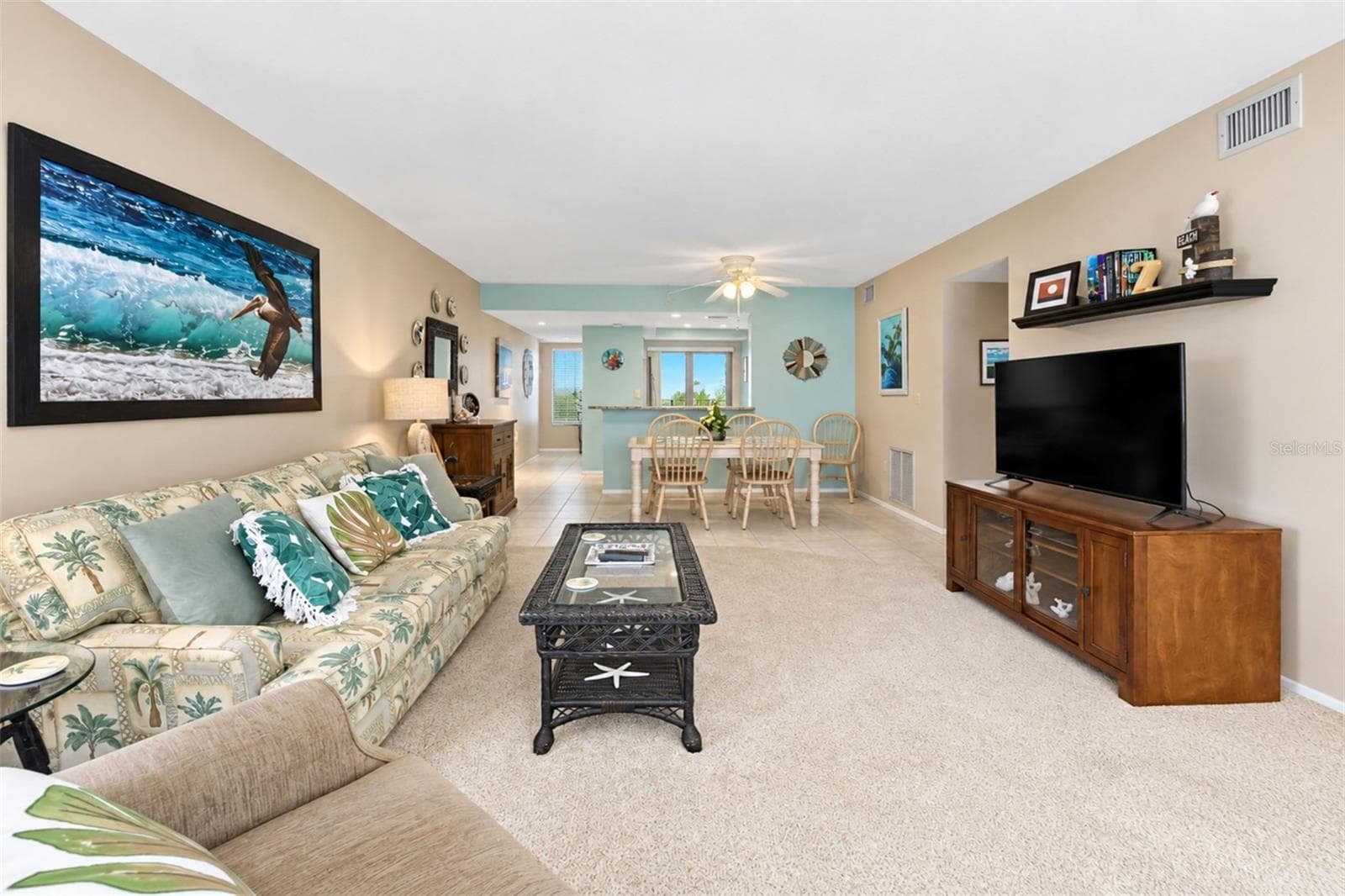 The view of the living & dining area from the lanai. - 2950 N BEACH RD #A321, ENGLEWOOD