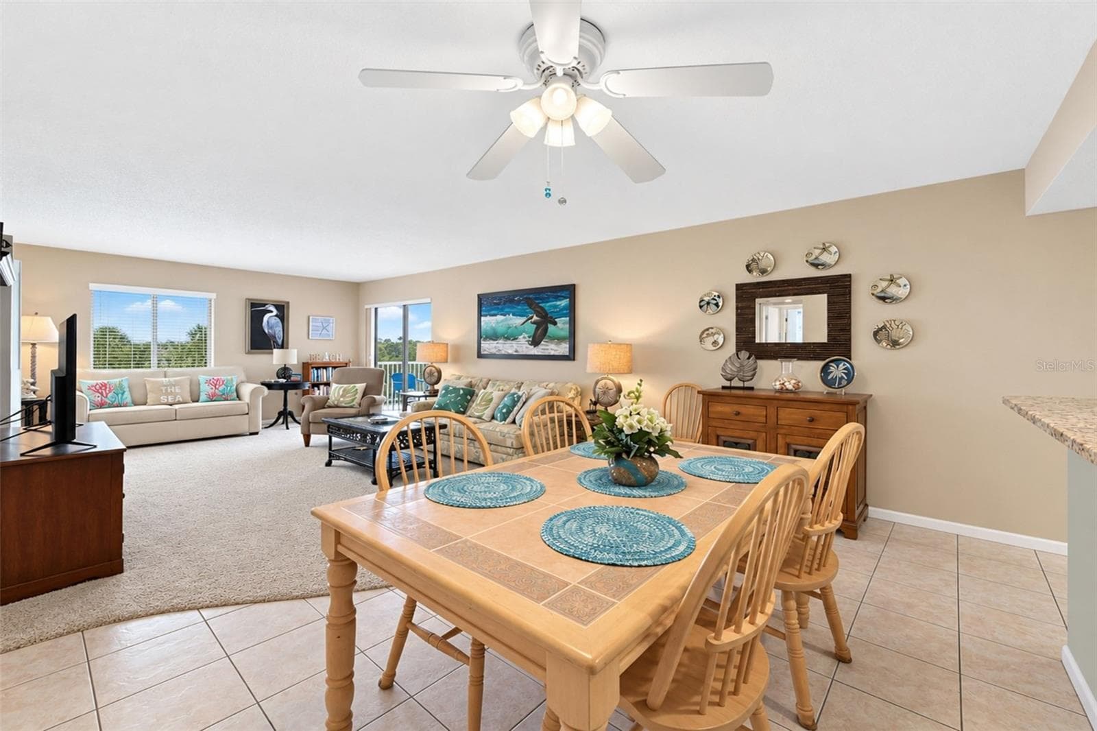 The dining room looking into the living room. - 2950 N BEACH RD #A321, ENGLEWOOD