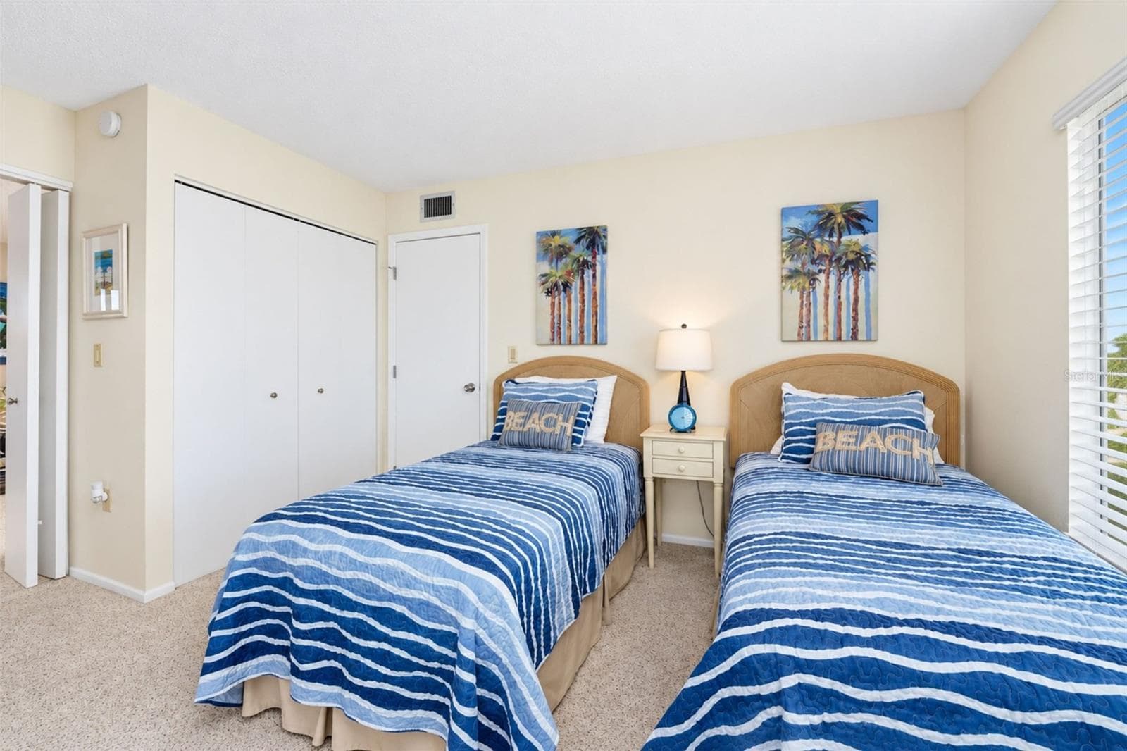 The guest bedroom features a wall closet. - 2950 N BEACH RD #A321, ENGLEWOOD
