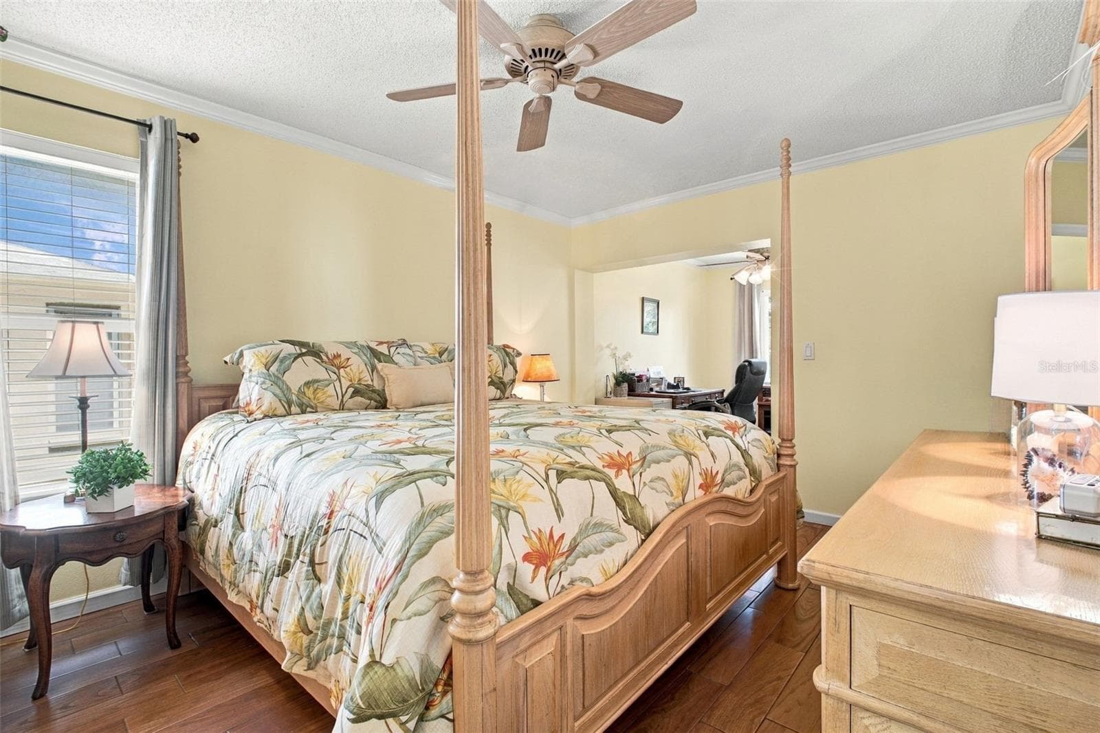 Massive primary retreat big enough for a king & features beautiful tile "wood look" flooring~ - 1743 MACDONNELL DR, PALM HARBOR