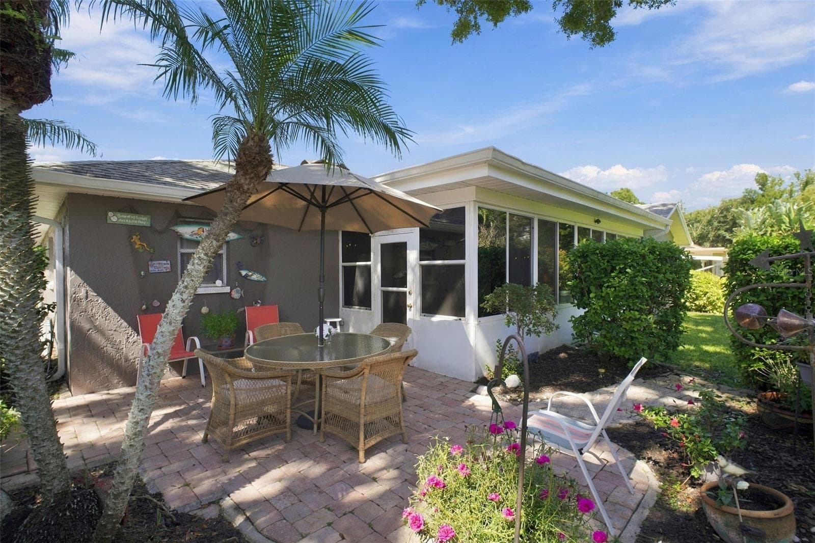 You'll enjoy relaxing here with your morning coffee or evening wine~ - 1743 MACDONNELL DR, PALM HARBOR