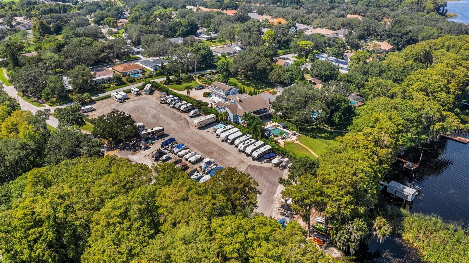 Amenities include free RV or boat storage in a secure lot with a boat ramp~ - 1743 MACDONNELL DR, PALM HARBOR