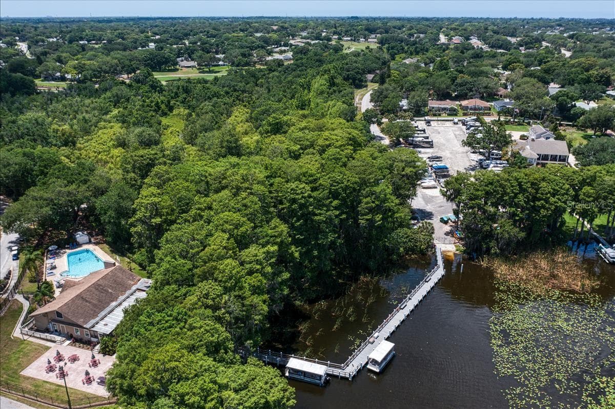 Lake Tarpon Lodge connected to RV lot & boat ramp by an open dock & fishing pier~ - 1743 MACDONNELL DR, PALM HARBOR