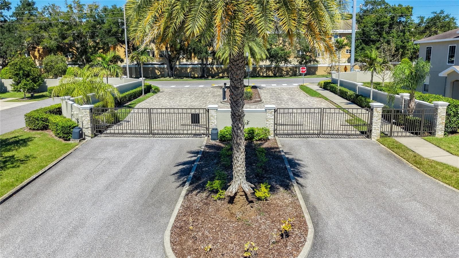 Beautifully manicured, GATED COMMUNITY of Montclair Lake Townhomes, you'll appreciate the lovely surroundings, scenic ponds, and COMMUNITY POOL - 2270 MONTVIEW DR, CLEARWATER