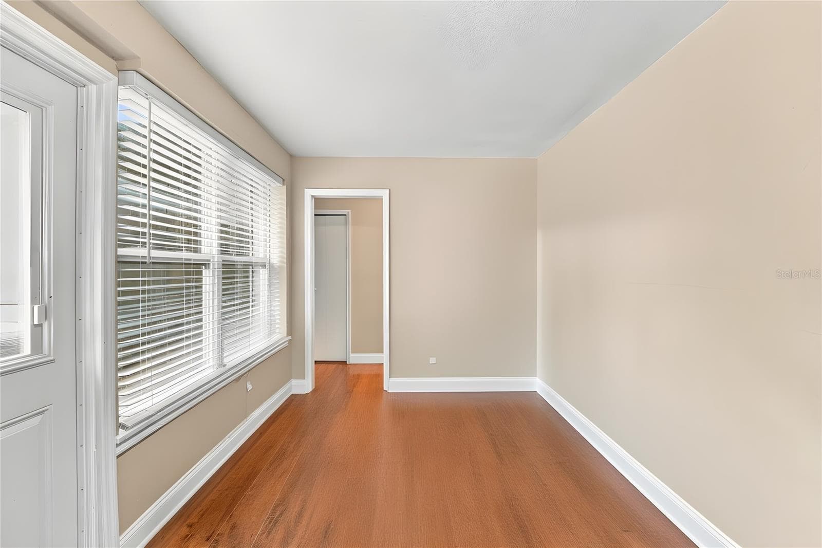 Dining room with Furniture removed - 735 N SANS SOUCI AVE, DELAND