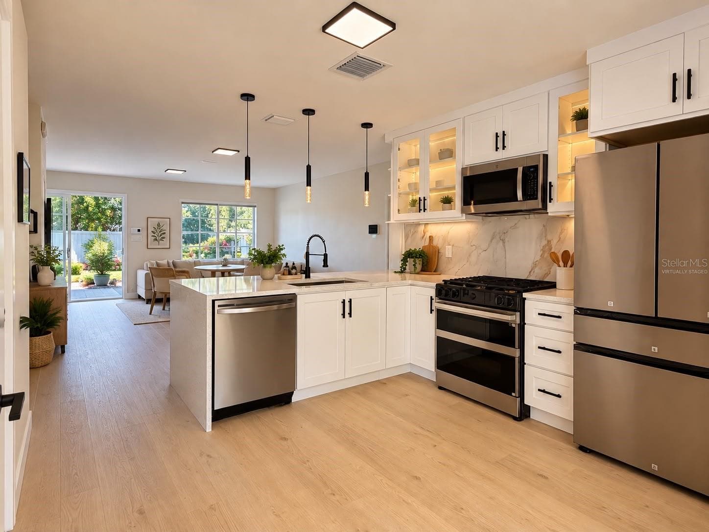 Virtually Staged Living Room and Kitchen - 4914 CORTEZ DR, ORLANDO