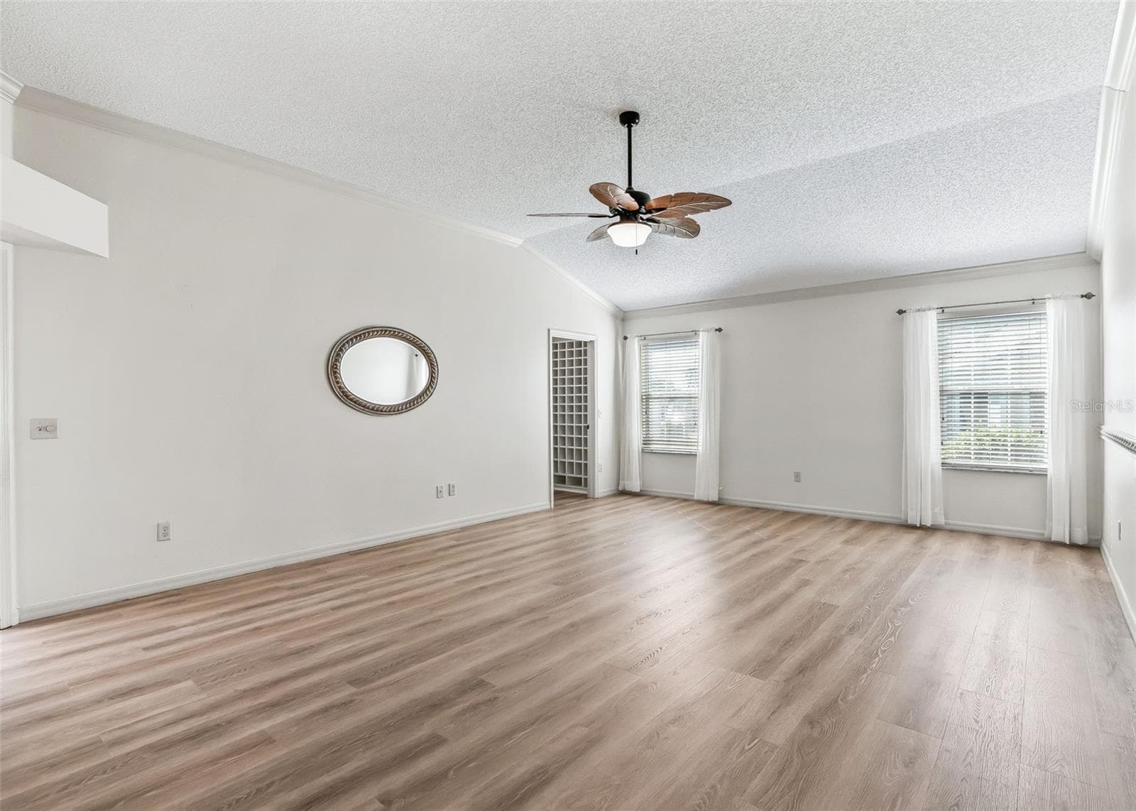 LVP Flooring. Corner Walk-In Closet - 2762 MORVEN PARK WAY, THE VILLAGES