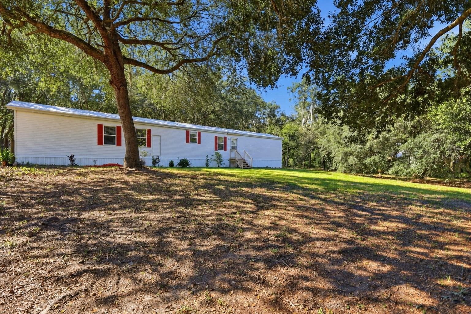 Manufactured Home at 2138 LAKE ELLA RD, FRUITLAND PARK, photo 3 of 64