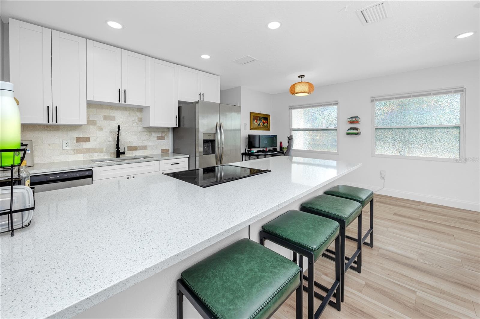 View from the kitchen into dining area - 5735 BURLINGTON AVE N, ST PETERSBURG