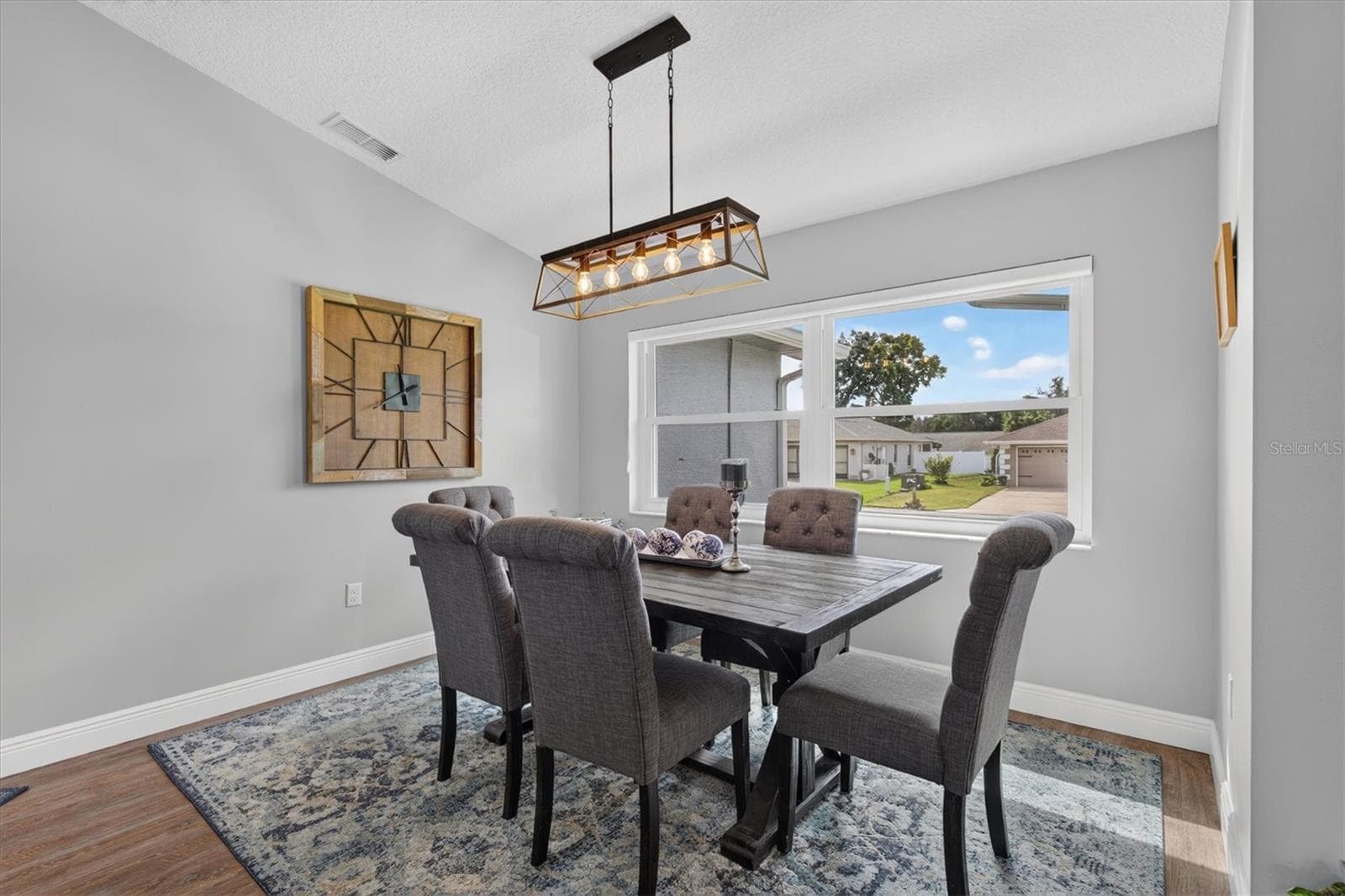 Dining Room with Double Paned Picture Window - 8185 SPANISH OAK DR, SPRING HILL