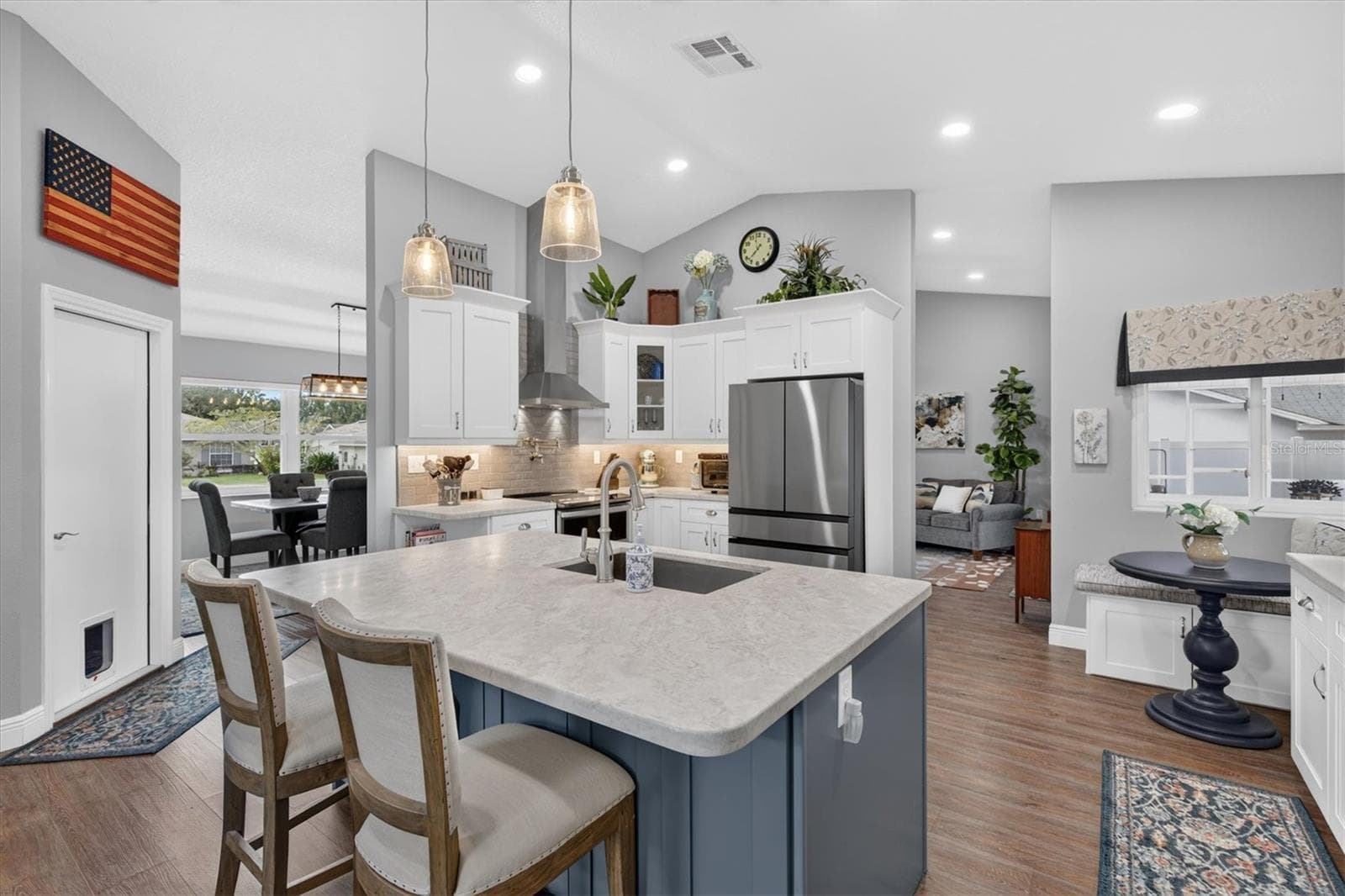 Two tone cabinetry with contrasting Island - 8185 SPANISH OAK DR, SPRING HILL