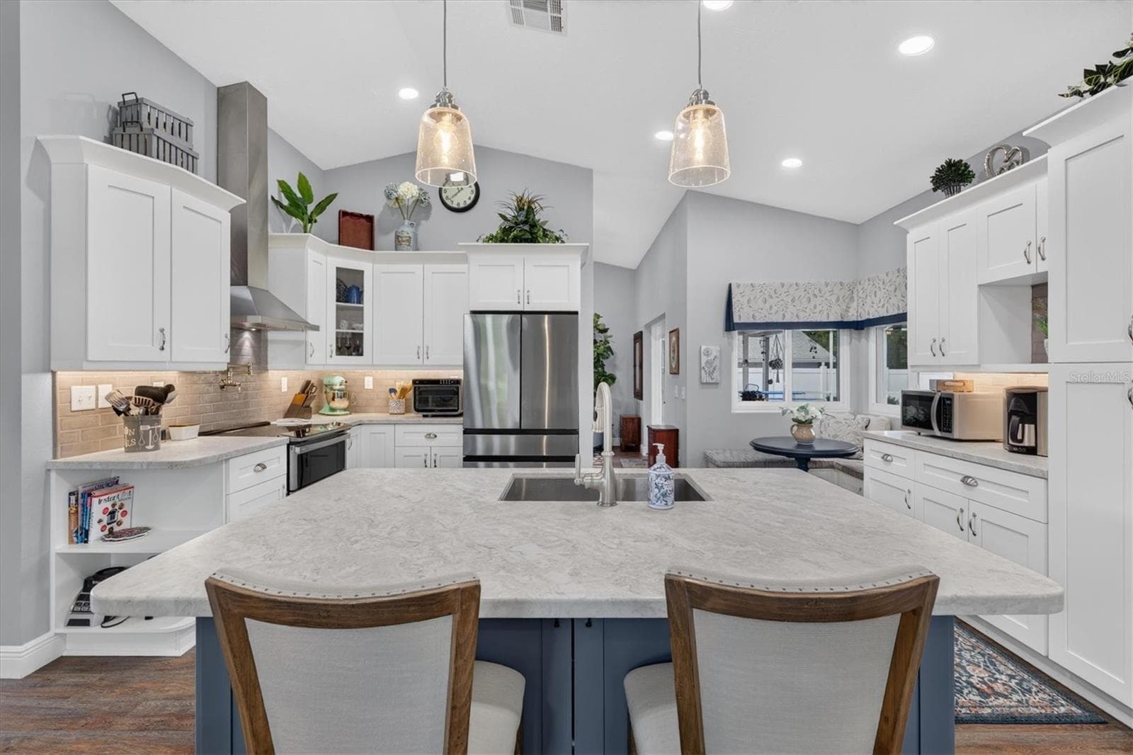 Kitchen Island / Breakfast Bar with Additional Cabinets - 8185 SPANISH OAK DR, SPRING HILL