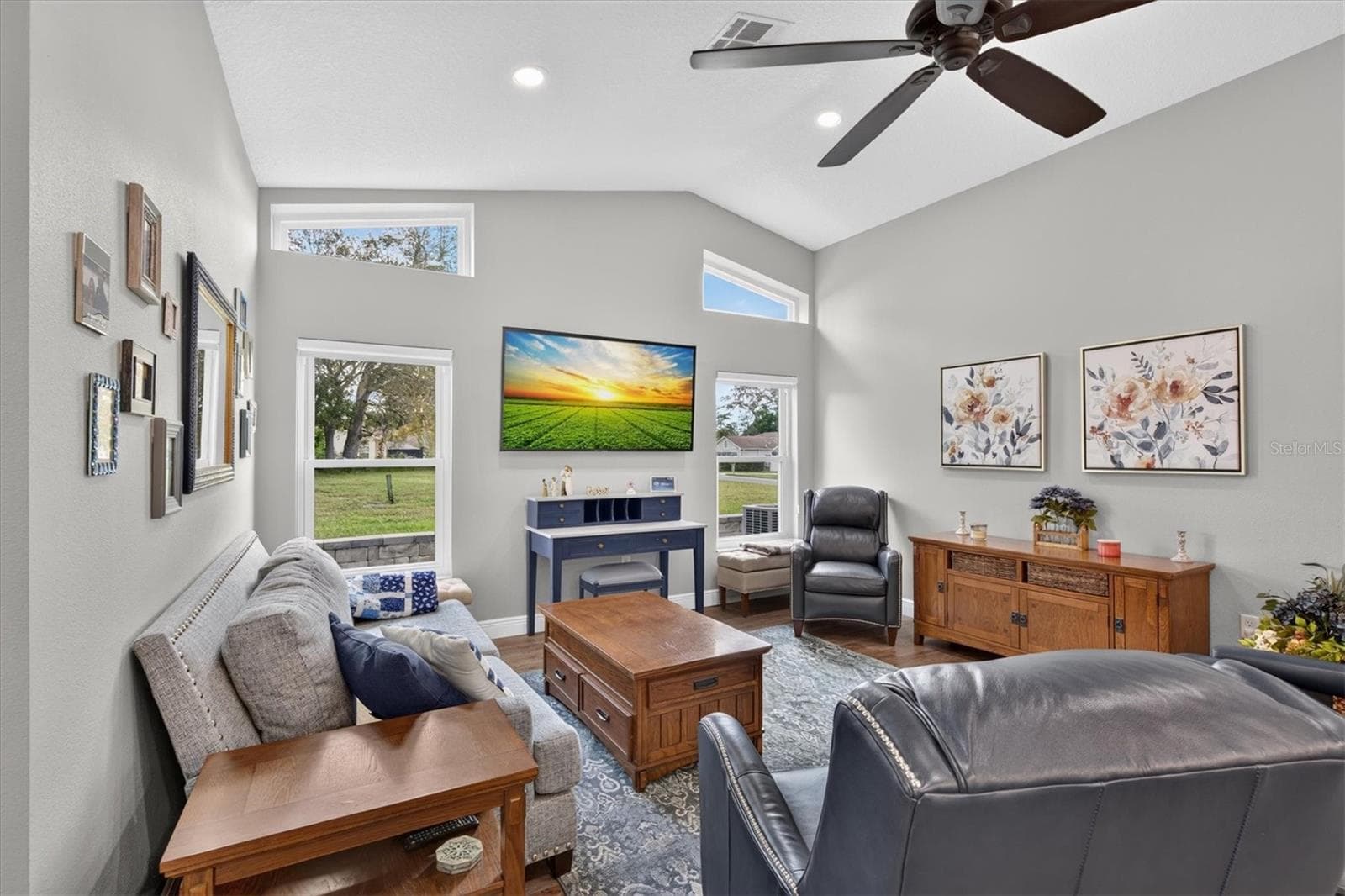 Family Room with Vaulted Ceiling & Transom Windows - 8185 SPANISH OAK DR, SPRING HILL