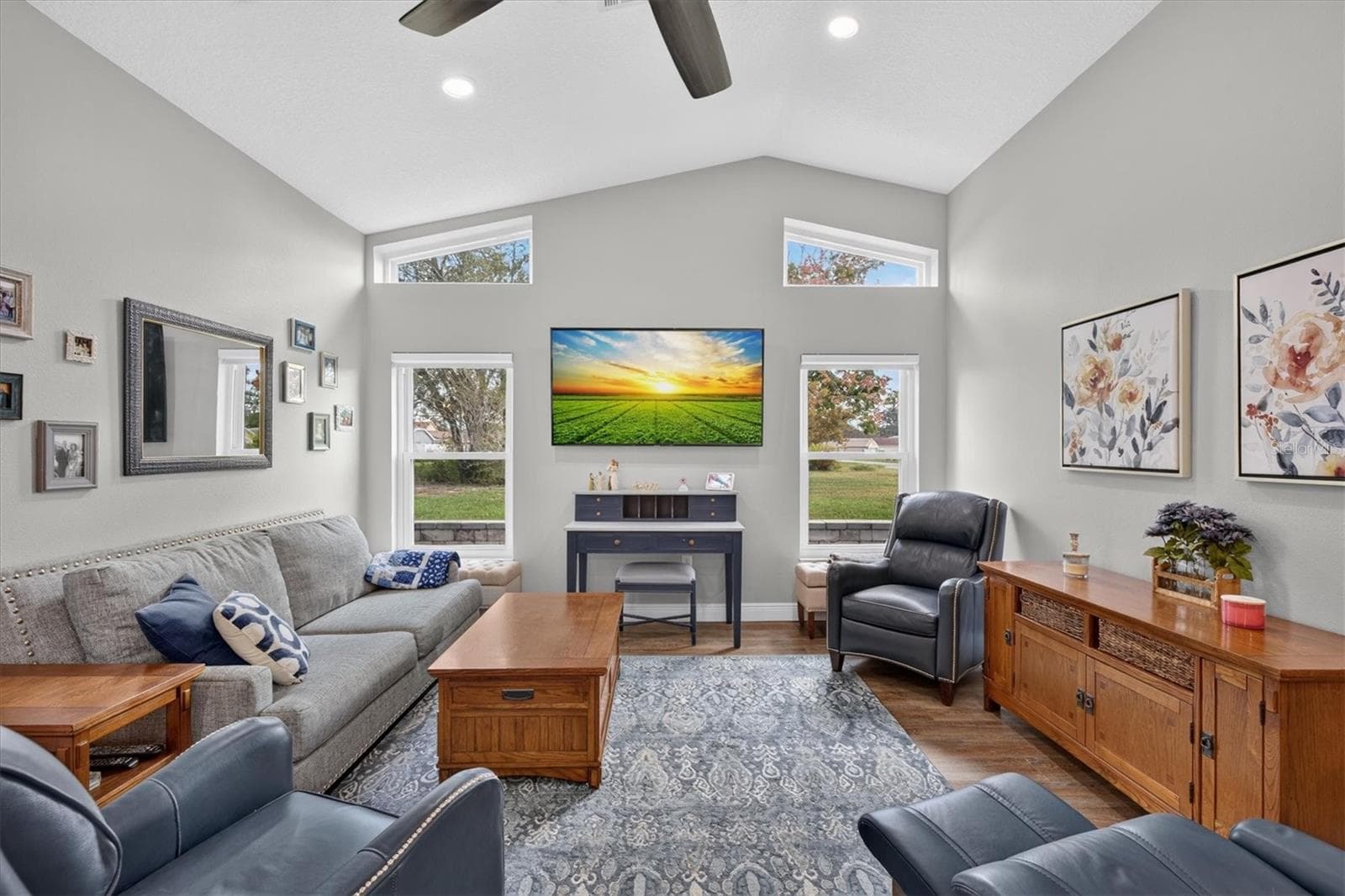 Family Room with Vaulted Ceiling & Transom Windows - 8185 SPANISH OAK DR, SPRING HILL