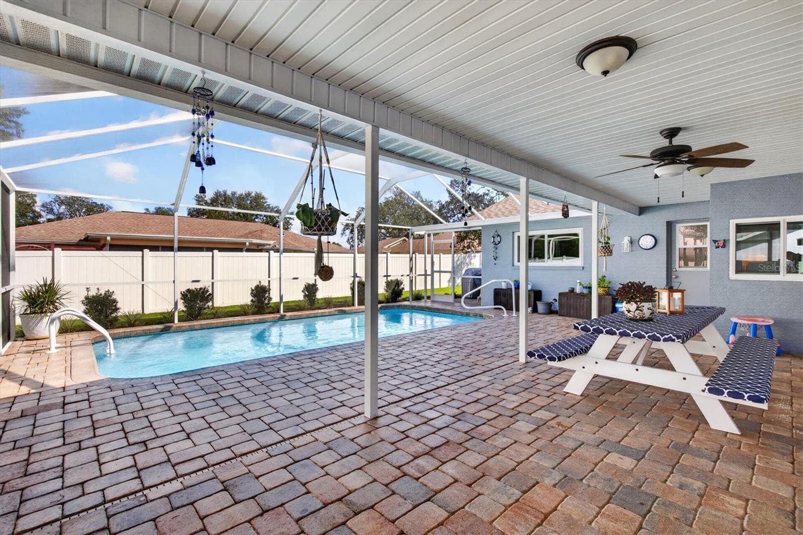 Paved Pool Area & Covered Lanai - 8185 SPANISH OAK DR, SPRING HILL