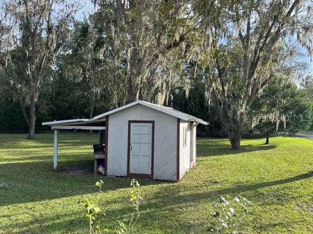 Plus a generous storage building with extra covered space on the side! - 24683 W US HIGHWAY 27, HIGH SPRINGS