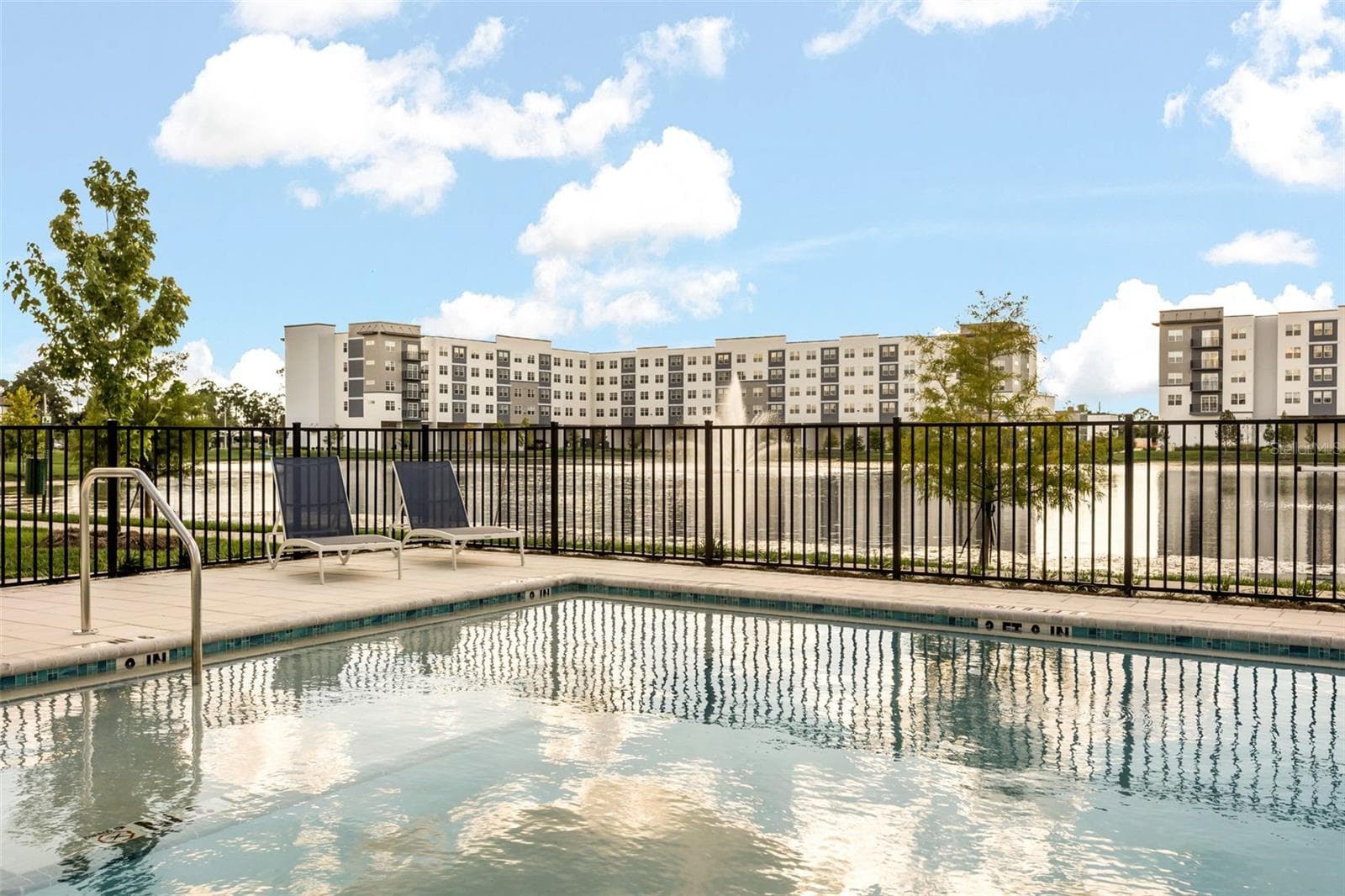 Built in 2026, this brand-new residence at 5591 Millenia Park Blvd, Unit 209, offers the perfect blend of contemporary living, resort-inspired amenities, and exceptional convenience in the heart of Orlando. - 5591 MILLENIA PARK BLVD #209, ORLANDO