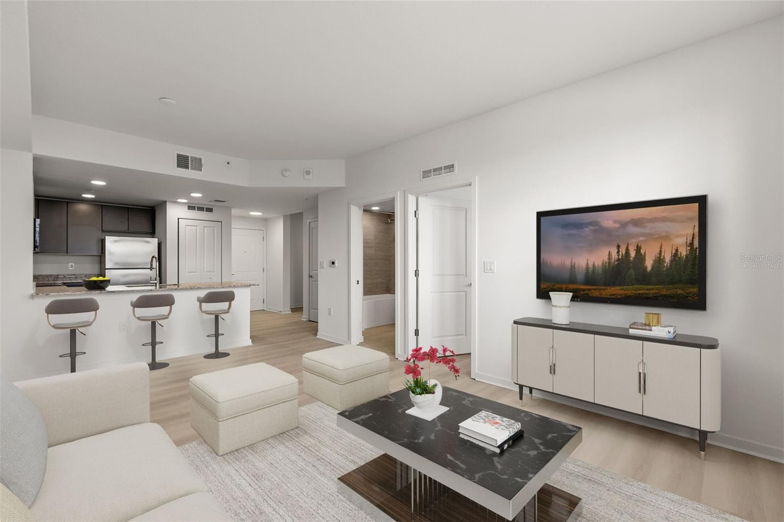 Virtually Staged. Living Room - 5591 MILLENIA PARK BLVD #209, ORLANDO