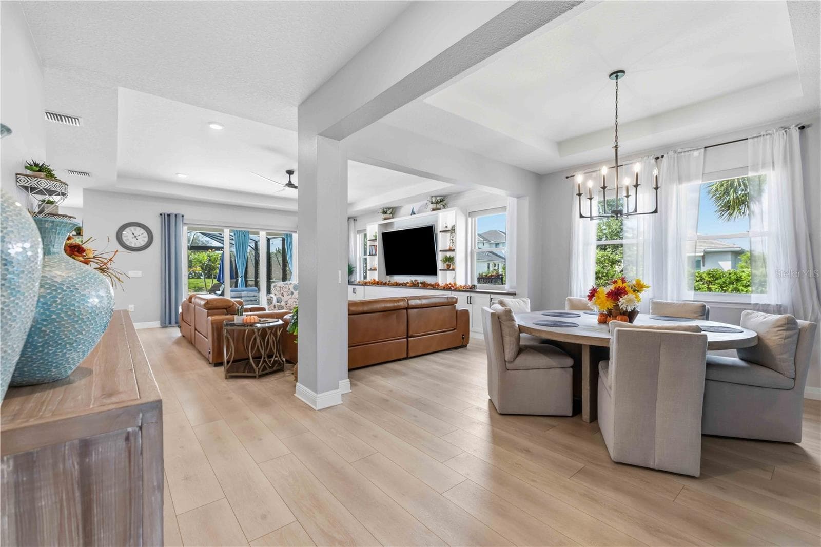 open floor plan featuring 9" wide plank flooring - 17604 BARLEY DR, LAKEWOOD RANCH