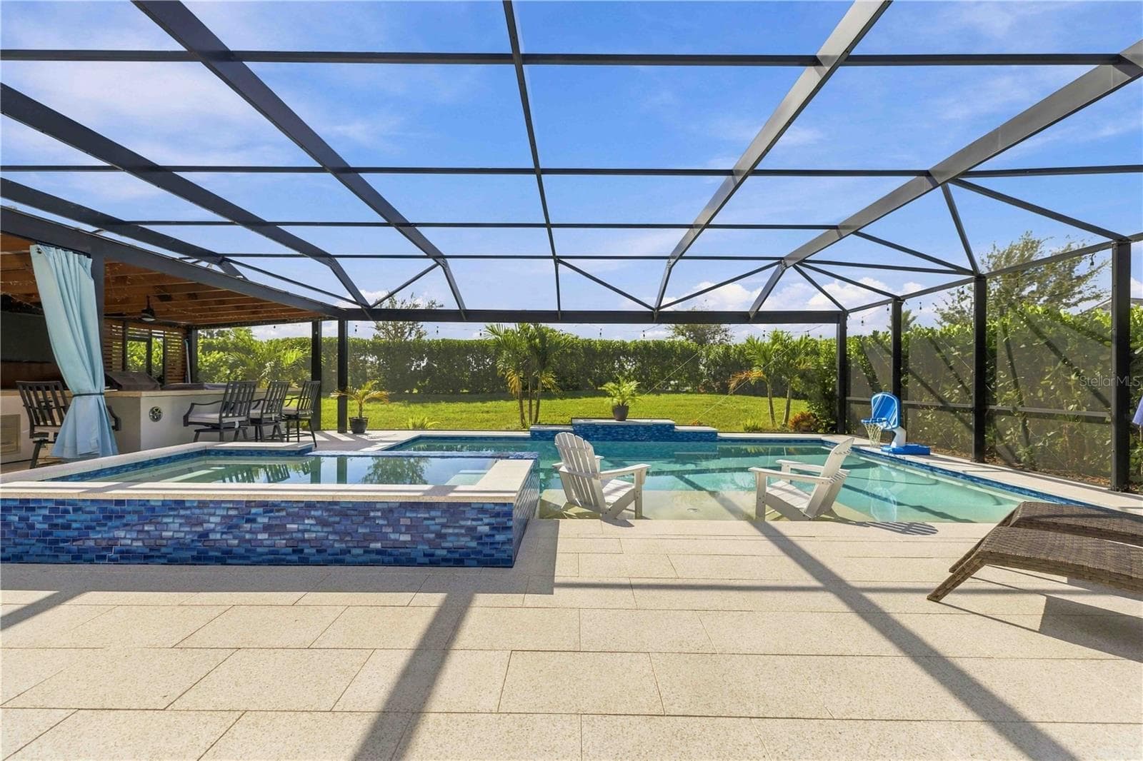 saltwater sports pool with 10 seater spa, featuring king + queen jets - 17604 BARLEY DR, LAKEWOOD RANCH