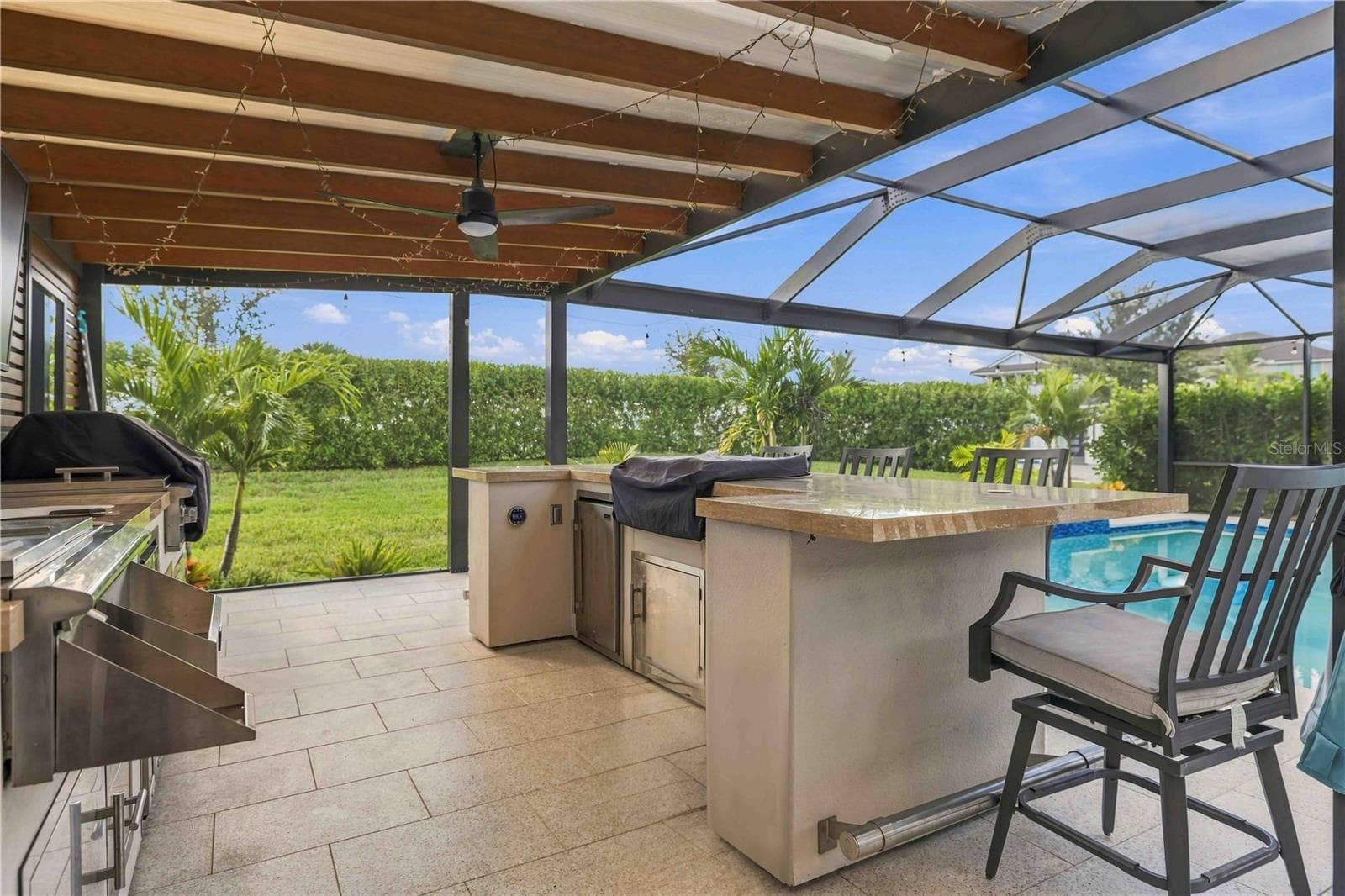 pergola with exquisite outdoor kitchen - 17604 BARLEY DR, LAKEWOOD RANCH