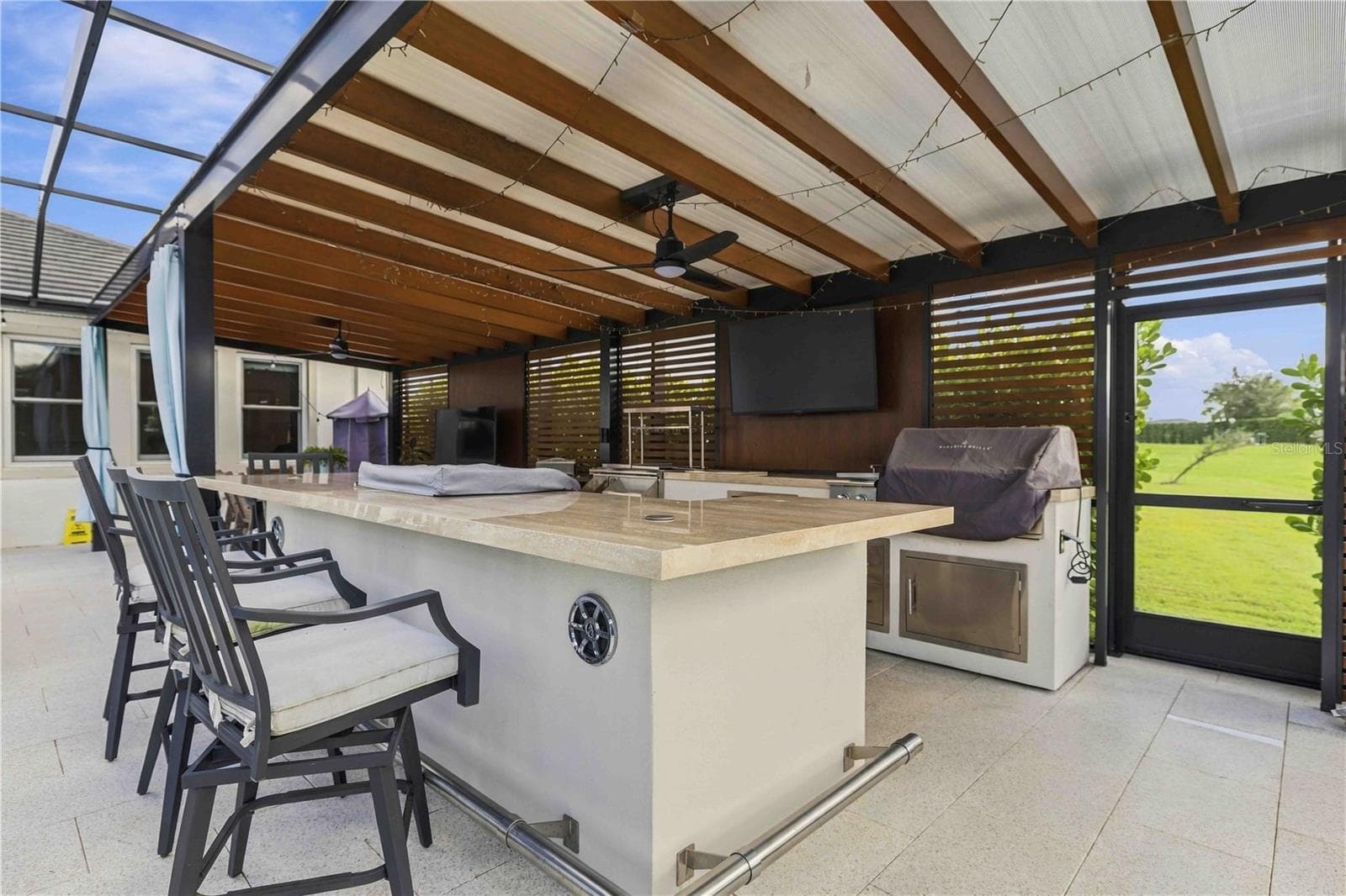 pergola with exquisite outdoor kitchen - 17604 BARLEY DR, LAKEWOOD RANCH