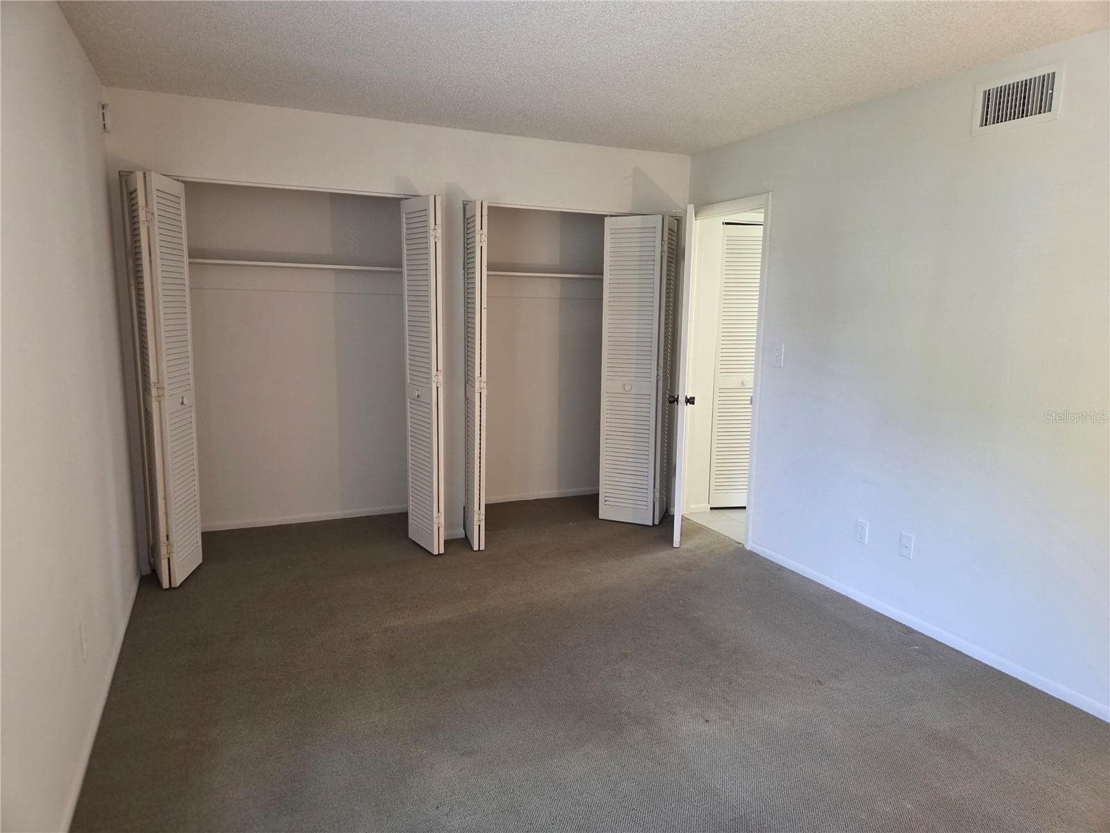 Bedroom closets - 610 MIDWAY DR #A, OCALA