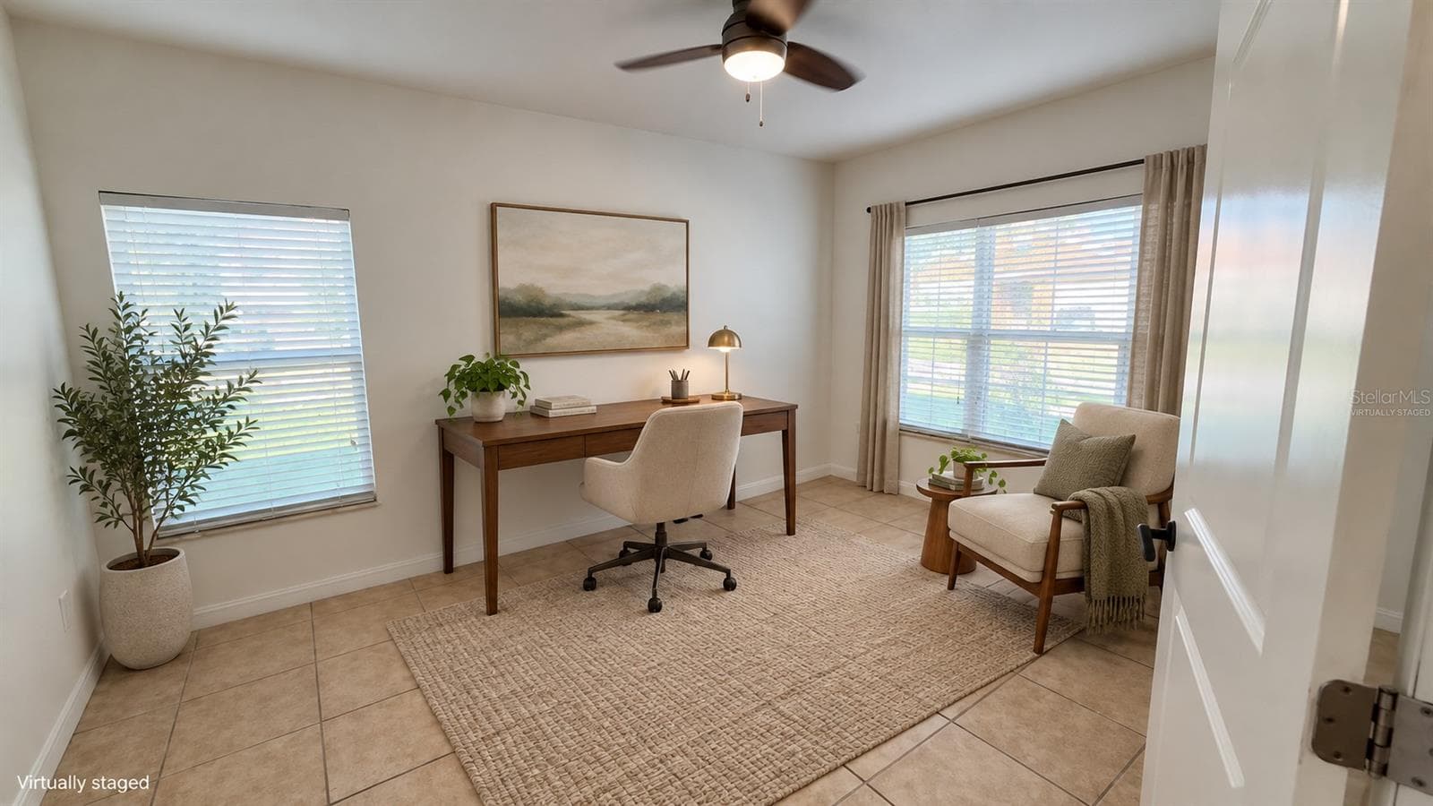 Virtually staged - Room shown as a home office and reading area. Digital furniture and decor; furnishings are not included. Original unstaged view retained. - 2255 SHEBOYGAN PL, KISSIMMEE