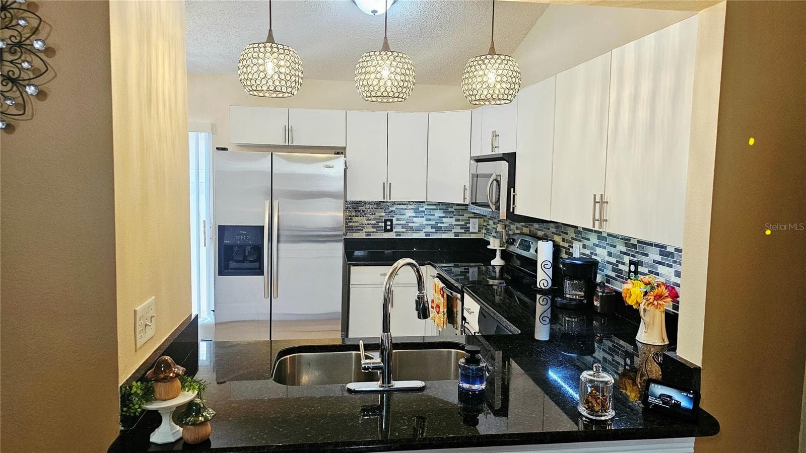 Kitchen Pass-Through View - 8632 FOLEY DR, ORLANDO
