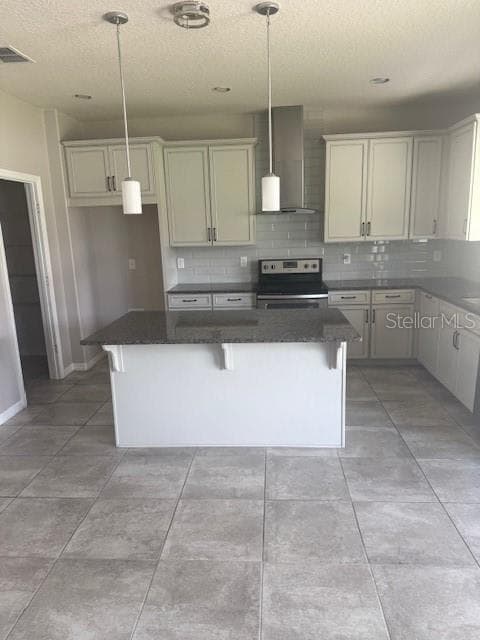 The kitchen and island have granite countertops. - 2513 ANNACELLA AVE, KISSIMMEE