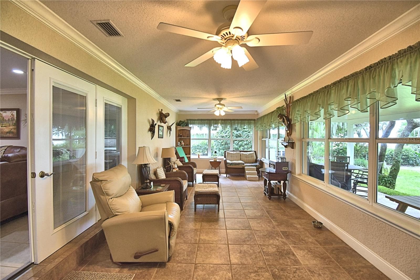 FL Room, wall of windows, view of lake & AC - 2391 S LAKE REEDY BLVD, FROSTPROOF