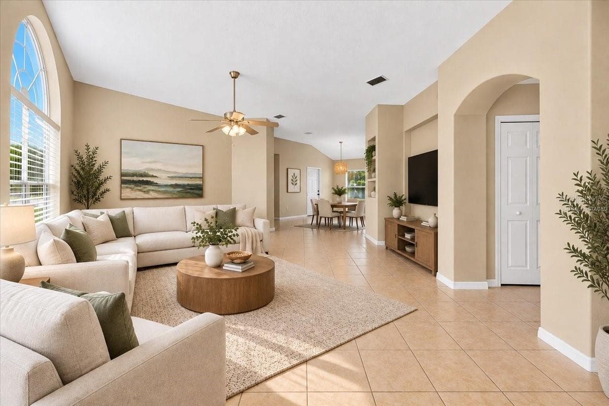Virtually Staged Photo of living area - 3 LEWIS DR, PALM COAST