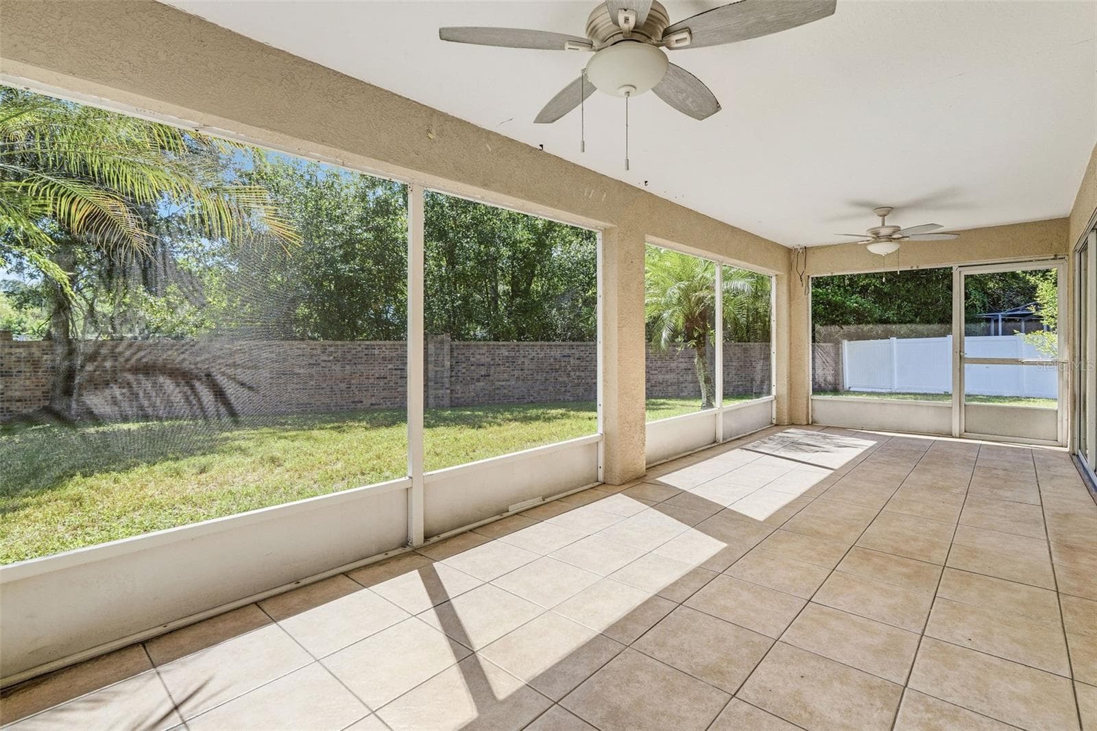 PATIO WITH 2 CEING FANS - 29002 OLD MARSH, WESLEY CHAPEL