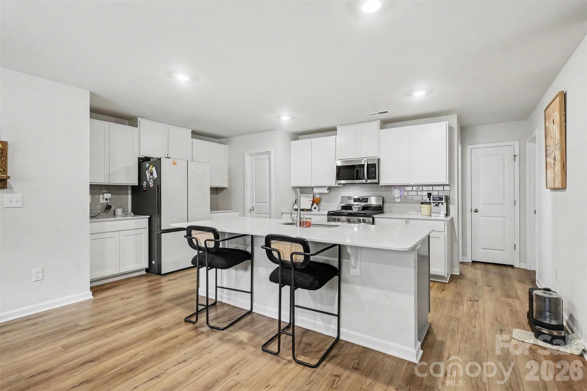 kitchen with bar seating - 149 Catawba Walk Way, Statesville