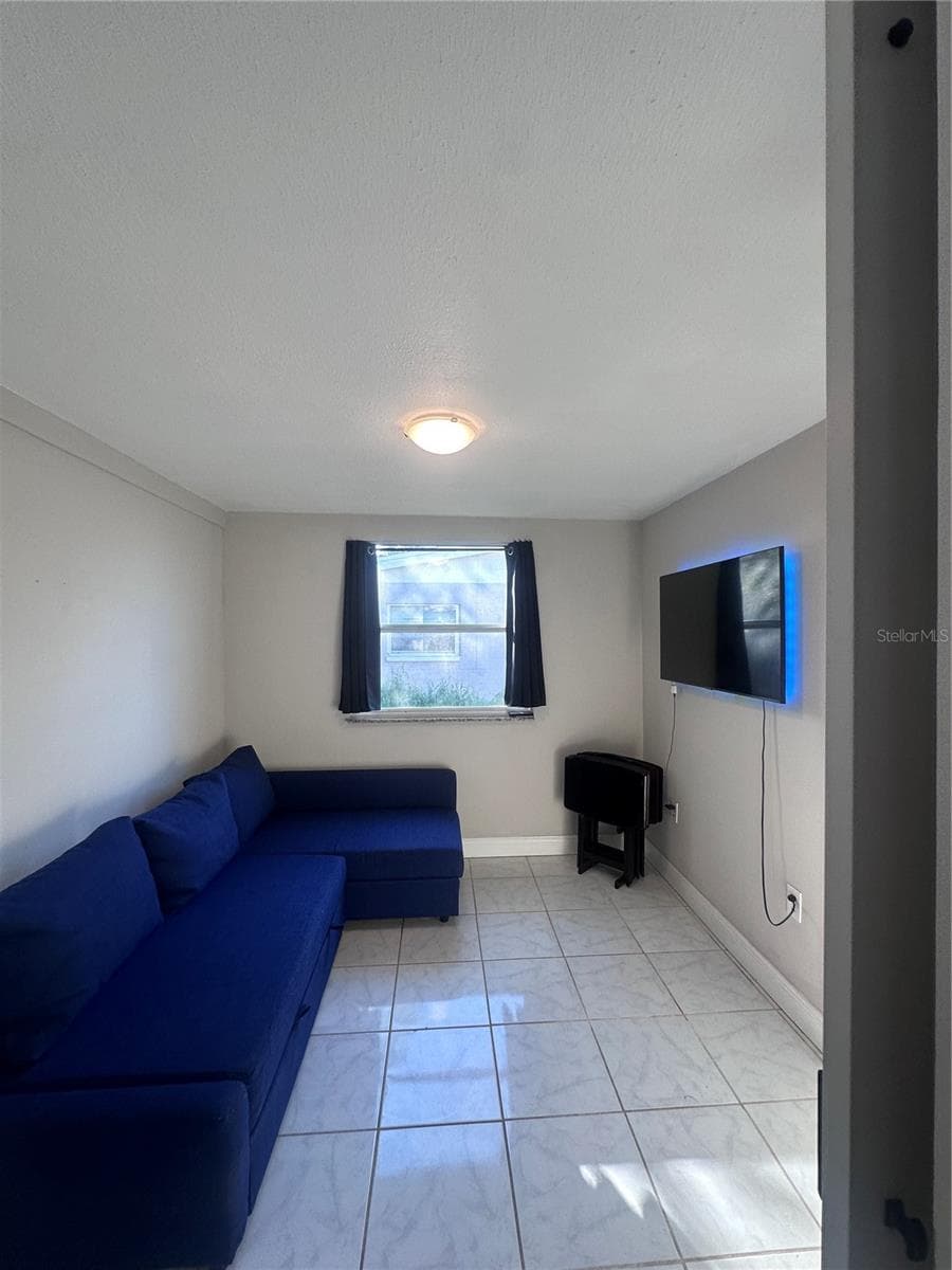 bonus room living room - 4762 54TH AVE N, ST PETERSBURG