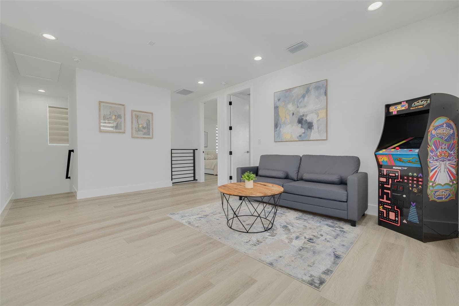 Loft outside of the three bedrooms on the upstairs level. - 7609 DEEDRA CIR, PORT RICHEY
