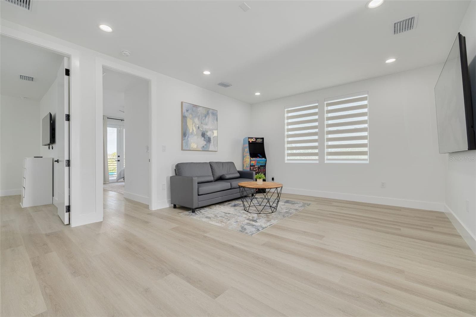 Loft outside of the three bedrooms on the upstairs level. - 7609 DEEDRA CIR, PORT RICHEY