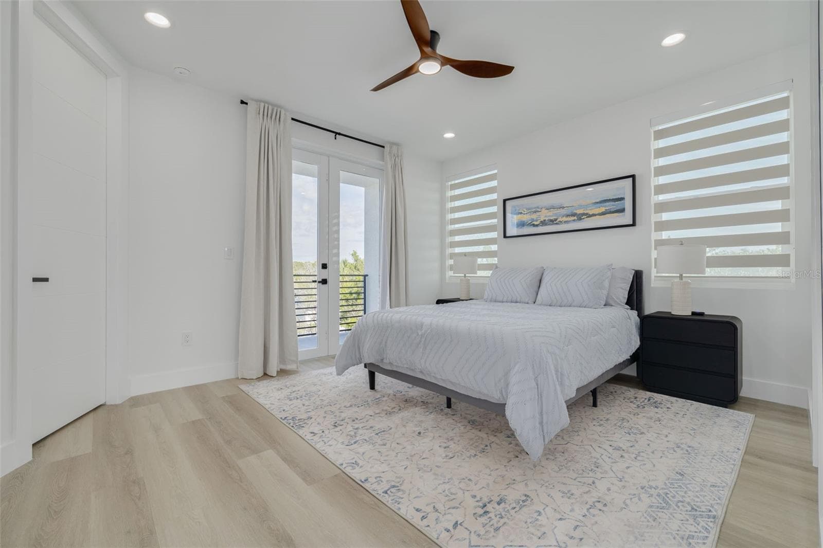 Second Bedroom with ensuite and balcony. - 7609 DEEDRA CIR, PORT RICHEY