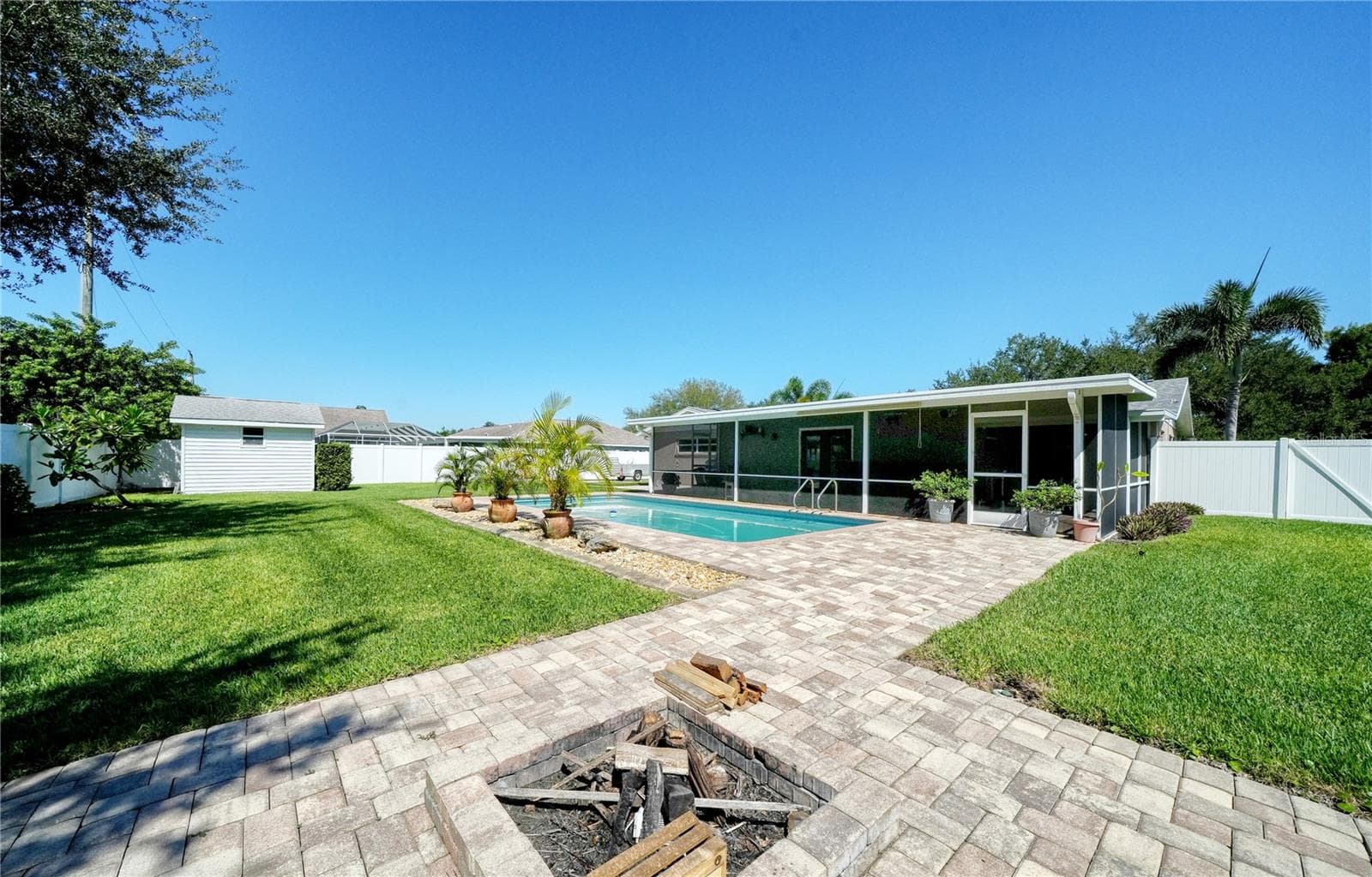 Firepit toward pool & Florida Room - 2304 50TH ST W, BRADENTON