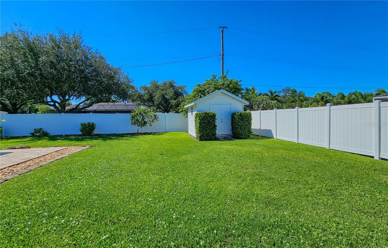 Backyard Shed from RV/Boat Parking pad behind Privacy fence - 2304 50TH ST W, BRADENTON