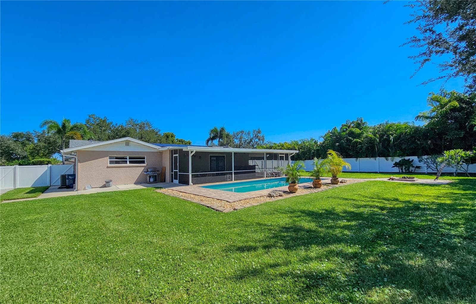 Backyard view of pool and Florida Room - 2304 50TH ST W, BRADENTON