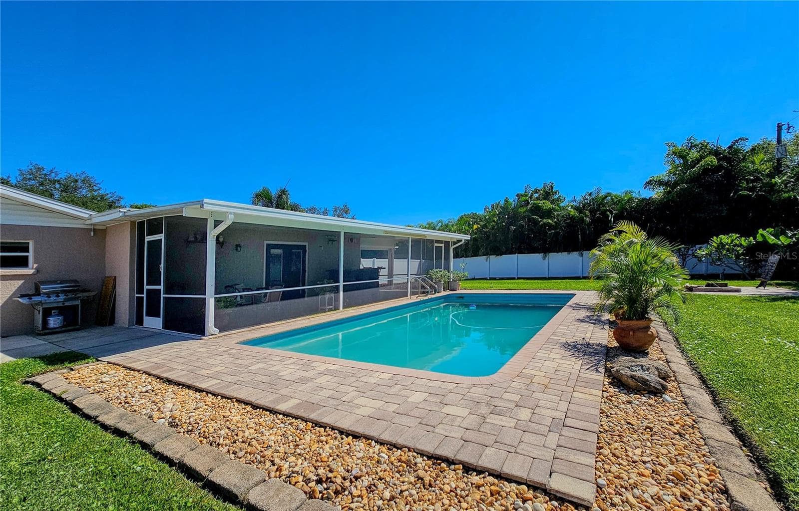 Brick Paver patio around freshwater 15 ' x 30' pool - 2304 50TH ST W, BRADENTON