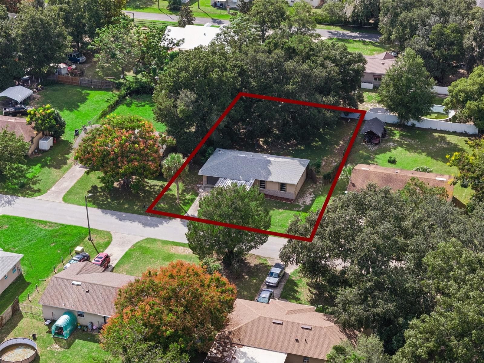 Aerial view of property. - 416 WINNERS CIR, LADY LAKE