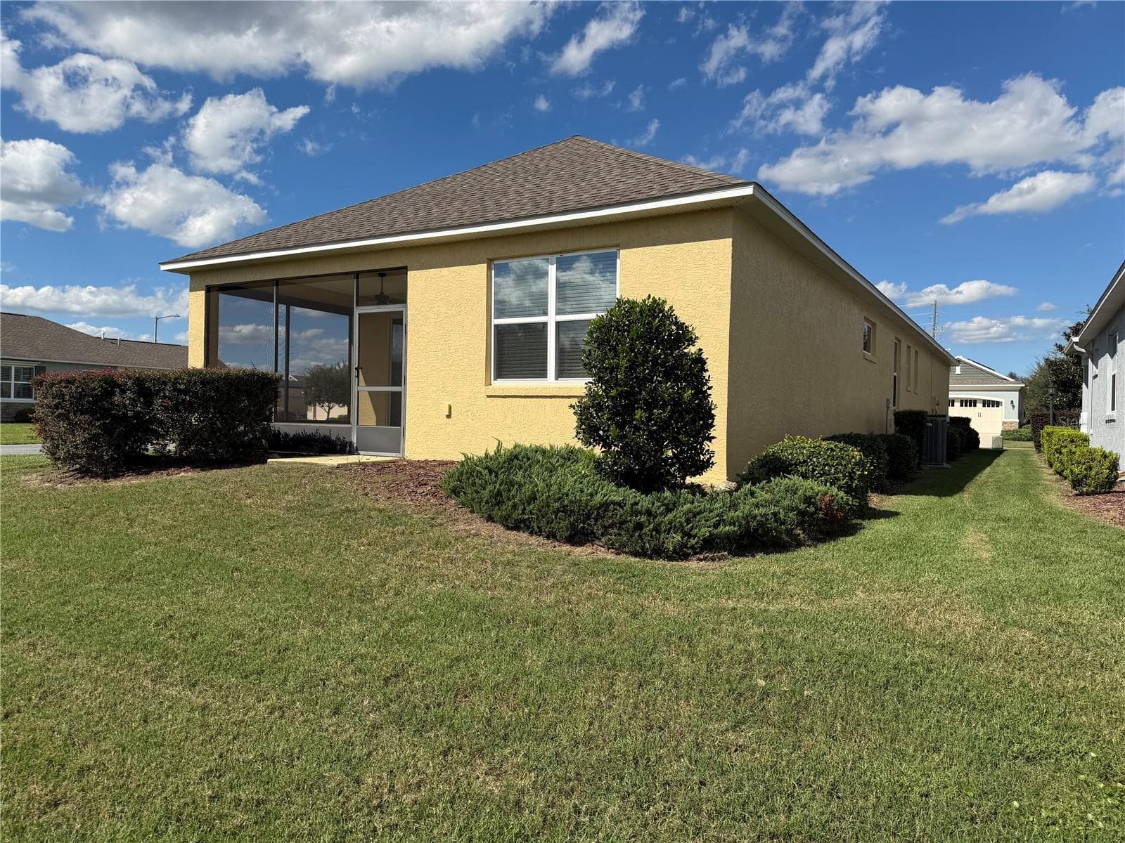 BACK YARD AND LEFT SIDE - 9818 SW 99TH LOOP, OCALA