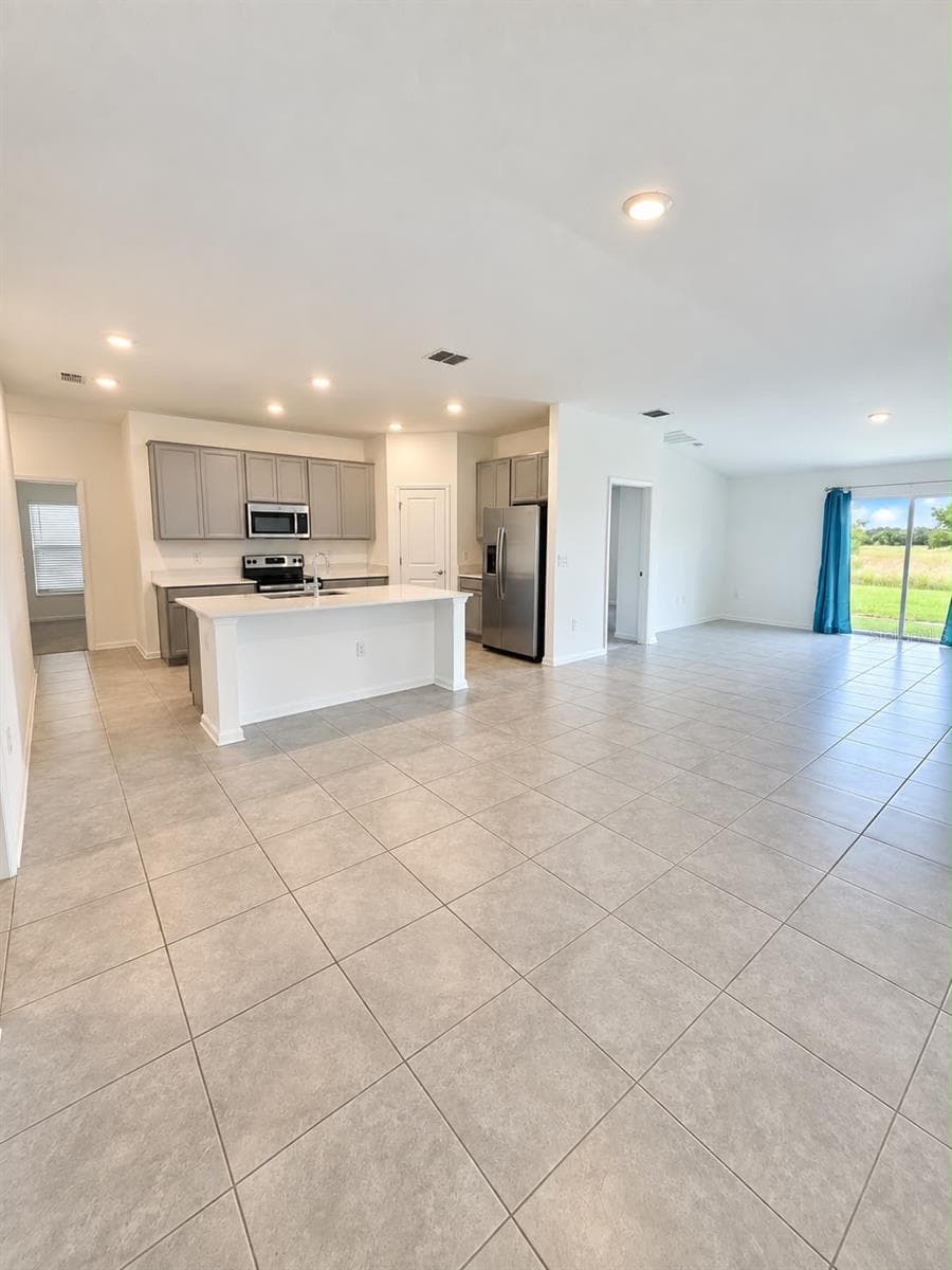 Open Concept Living and Kitchen - 285 PINEYWOODS ST, ST CLOUD