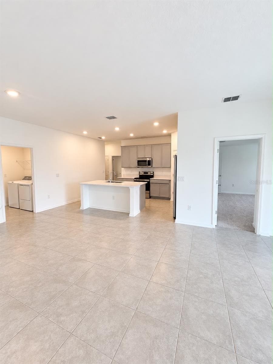 Living and Kitchen Alternate - 285 PINEYWOODS ST, ST CLOUD