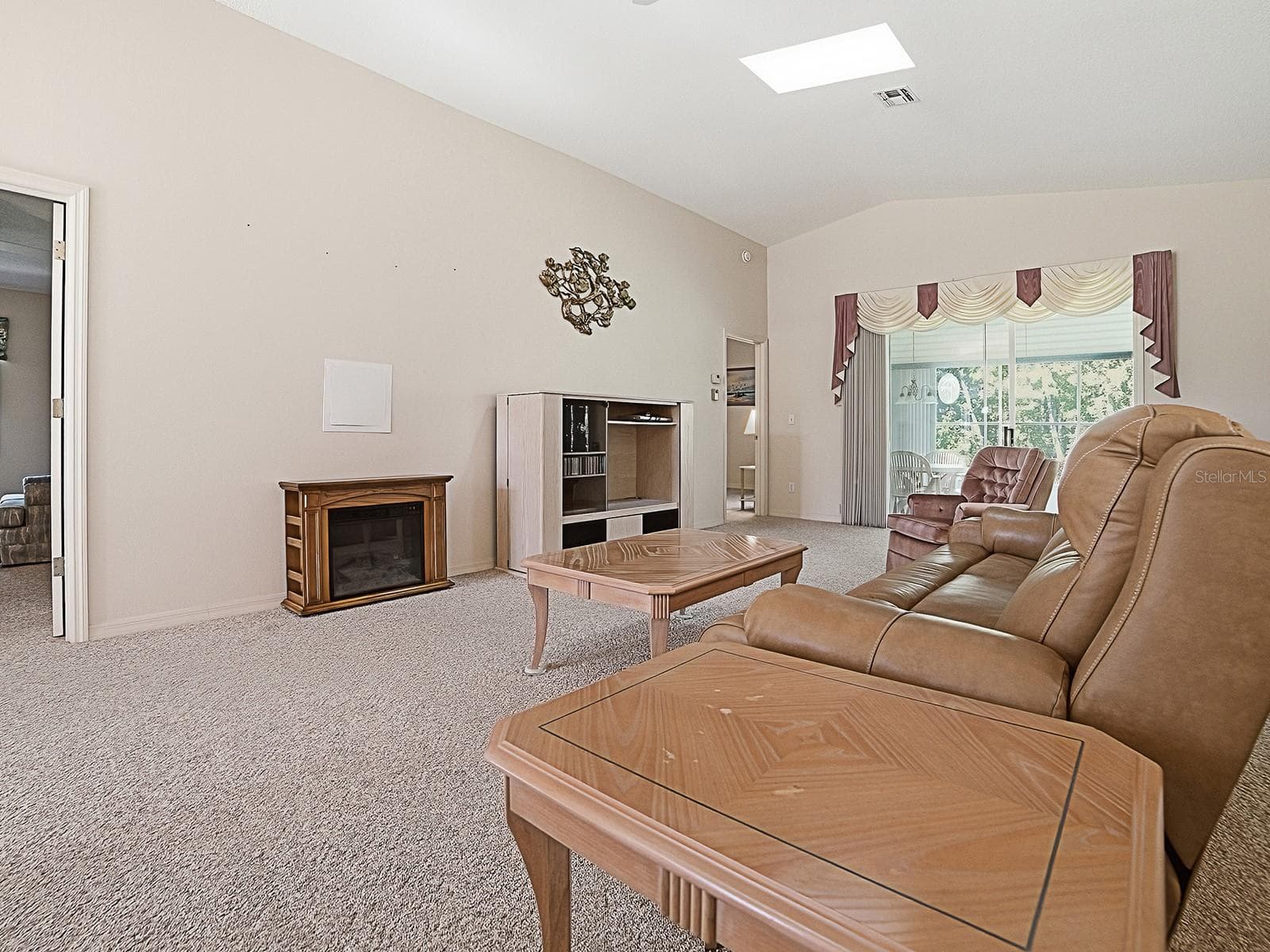 VIEW WITH SLIDERS TO THE LANAI - 424 RANCHWOOD DR, LEESBURG