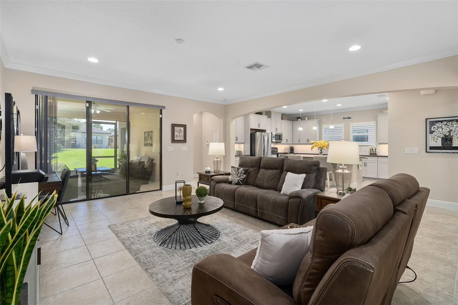 Family Room with the Kitchen in the background - 2607 CLEMSON RIDGE CT, CLERMONT