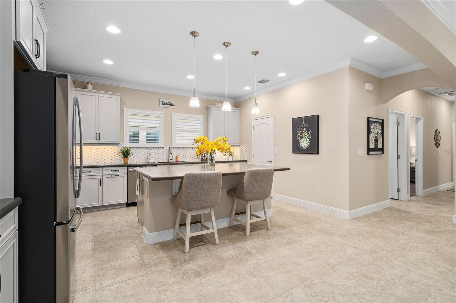 Upgraded Solid Wood 42" Cabinetry with Under Cabinet Lighting and a Large Walk-in pantry grace the Kitchen - 2607 CLEMSON RIDGE CT, CLERMONT